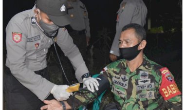 Mendukung-Pencegahan-Covid-19,-Baurkes-Polres-Mabar-Membagikan-Multivitamin-dan-Pemeriksaan-Kesehatan-Kepada-Petugas-Posko