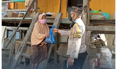Bantu-Masyarakat-Terdampak-Covid-19,-Bhabinkamtibmas-Polres-Mabar Door-to-Door-Bagikan-Daging-Qurban