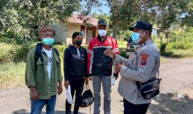 Cegah-Penyebaran-Covid,-Personil-Polsek-Komodo-Imbau-Masyarakat-Taat-Prokes