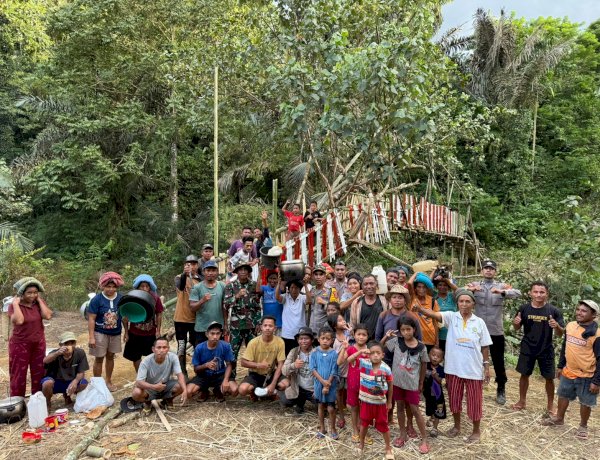 Meniti Asa di Atas Wae Songkang: Kala Polisi Hadir Lewat Jembatan Merah Putih